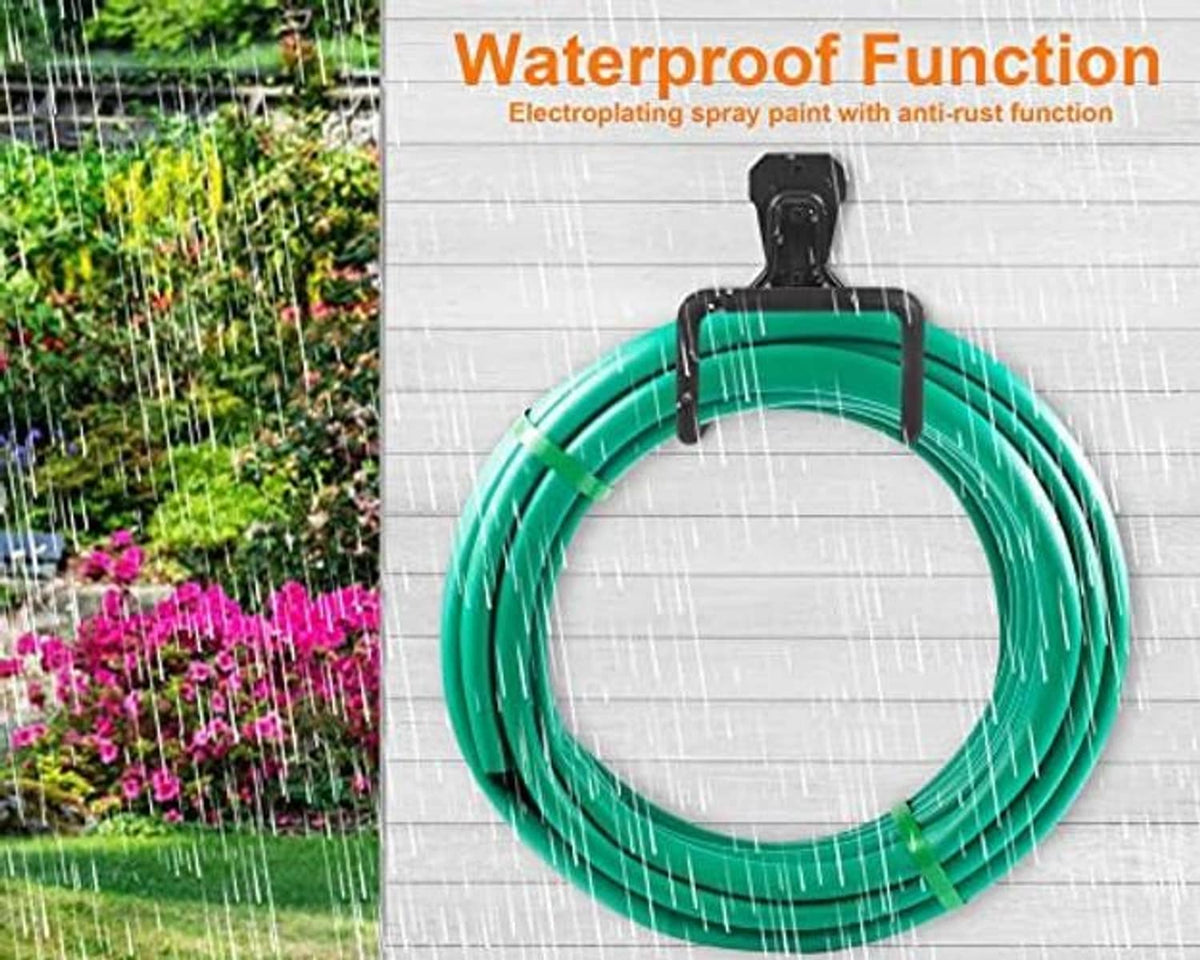 Black metal wall-mounted hose hanger holding a green garden hose loop