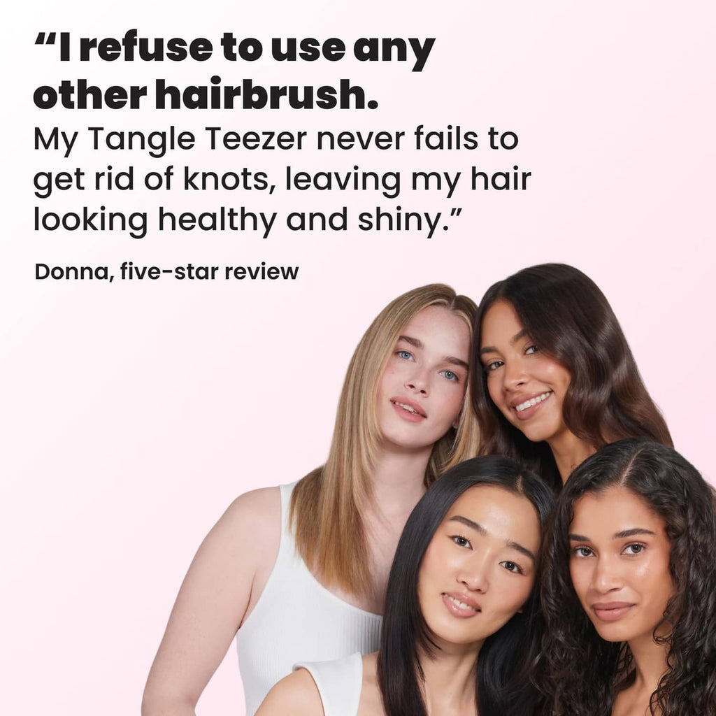 Group of four people smiling with a detangling hairbrush review