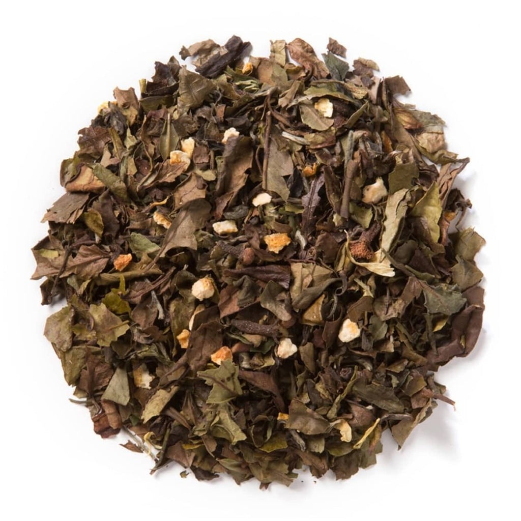 Loose leaf tea blend with dark leaves and visible orange peel pieces