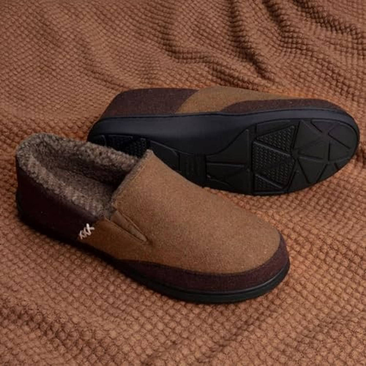 Coffee-brown slipper with faux-fur interior and grippy rubber sole close-up