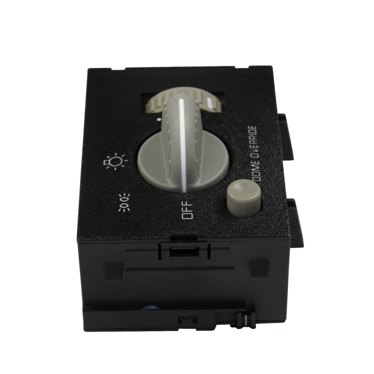 Black dash headlight switch top view with round light control knob and OFF button
