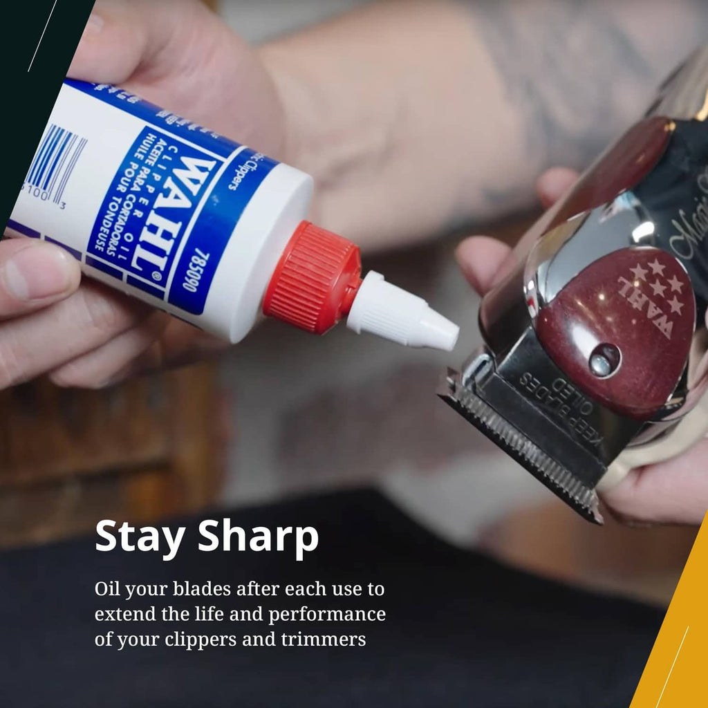 Clipper oil bottle dispensing drops onto a clipper blade