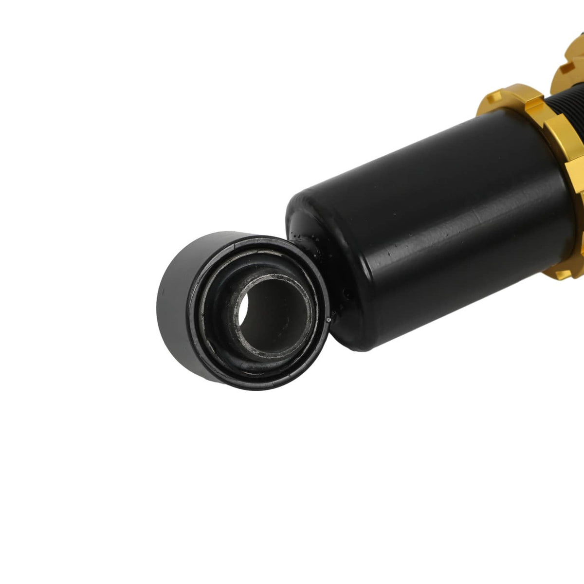Adjustable coilover shock absorber with black body and gold adjustment cap