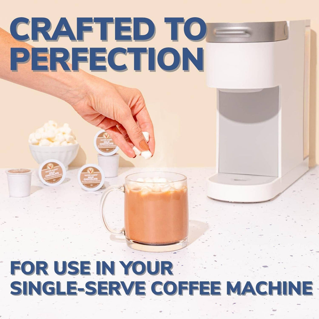 Single-serve milk chocolate hot cocoa pod with brewed cup and coffee machine