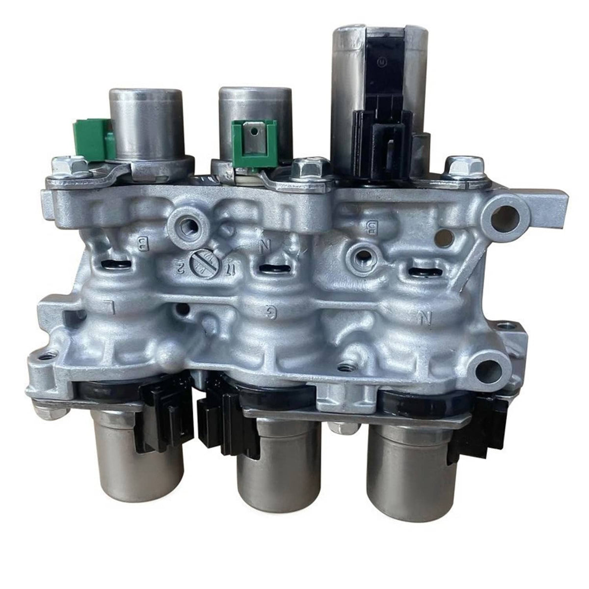Transmission solenoid block assembly, silver metal body with green terminals and three ports