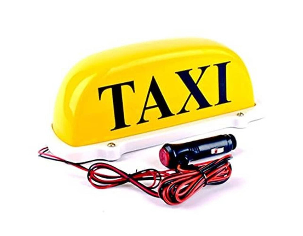 Yellow taxi roof LED sign light showing “TAXI” text, with attached red/black power leads.