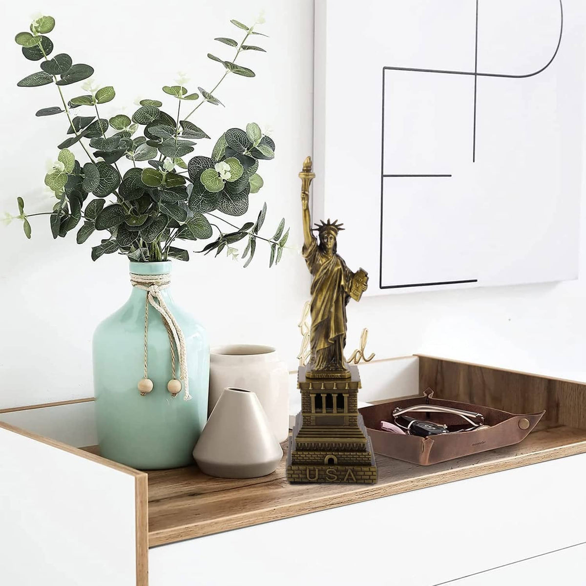 Bronze Statue of Liberty metal model souvenir on a shelf
