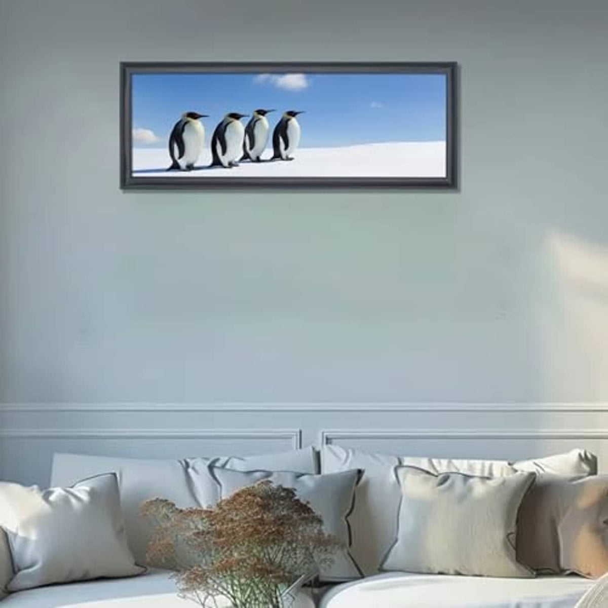 Black solid picture frame displaying a penguin photo on a wall