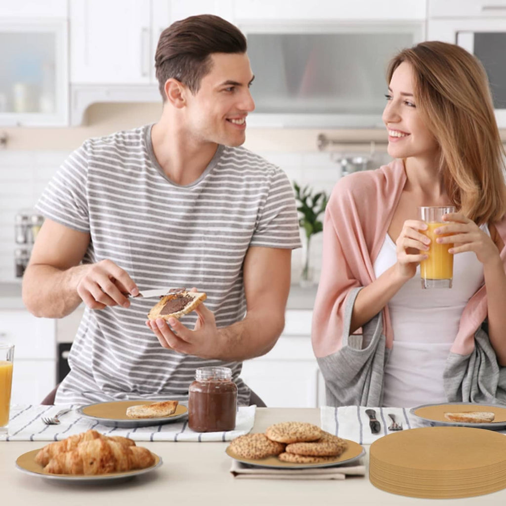 Brown unbleached parchment paper rounds placed on table with baked goods
