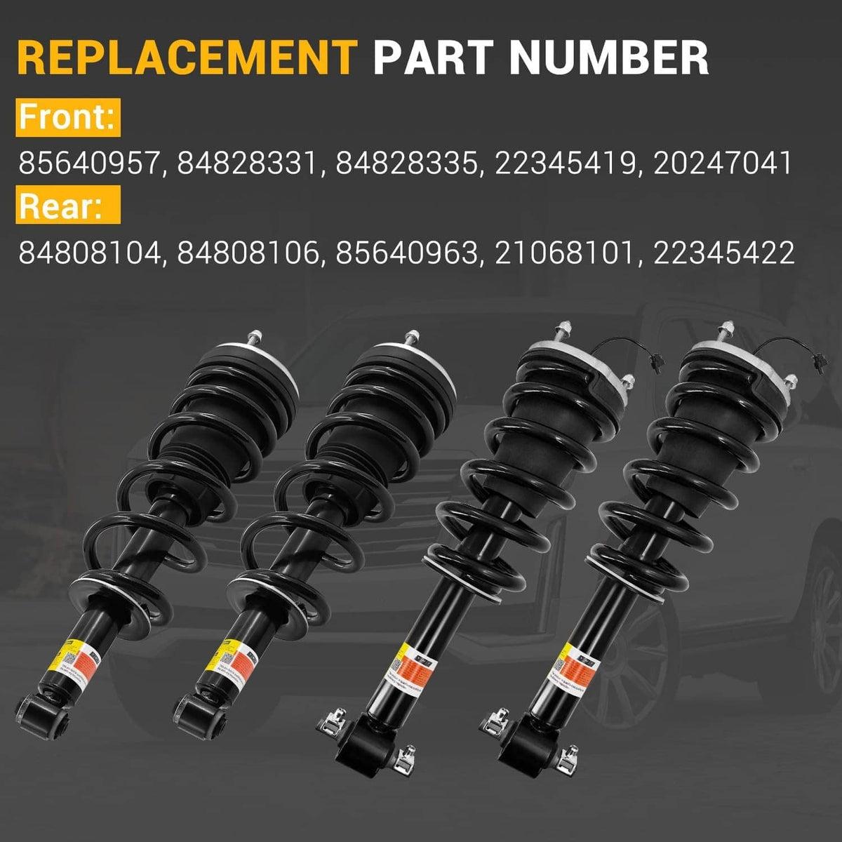Four black shock absorber struts with coil springs and bottom mounting shafts