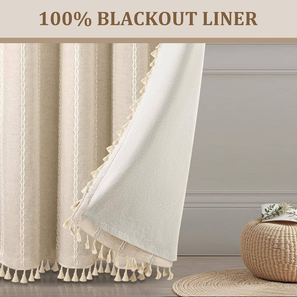 Beige blackout curtain with woven border and long tassel fringe at the hem