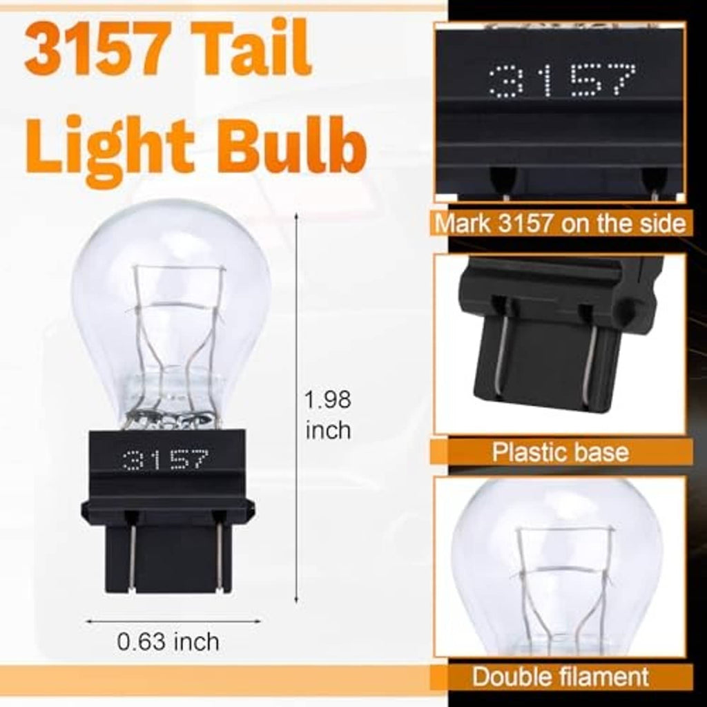 Clear dual-filament tail light bulb with black plastic base labeled 3157