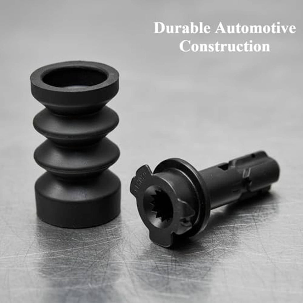Fuel tank filler door release latch and rubber boot, black plastic on work surface.