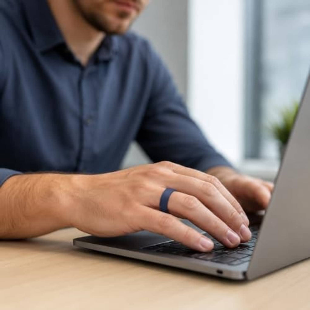 Ring cover on finger while typing on a laptop, slim protective sleeve