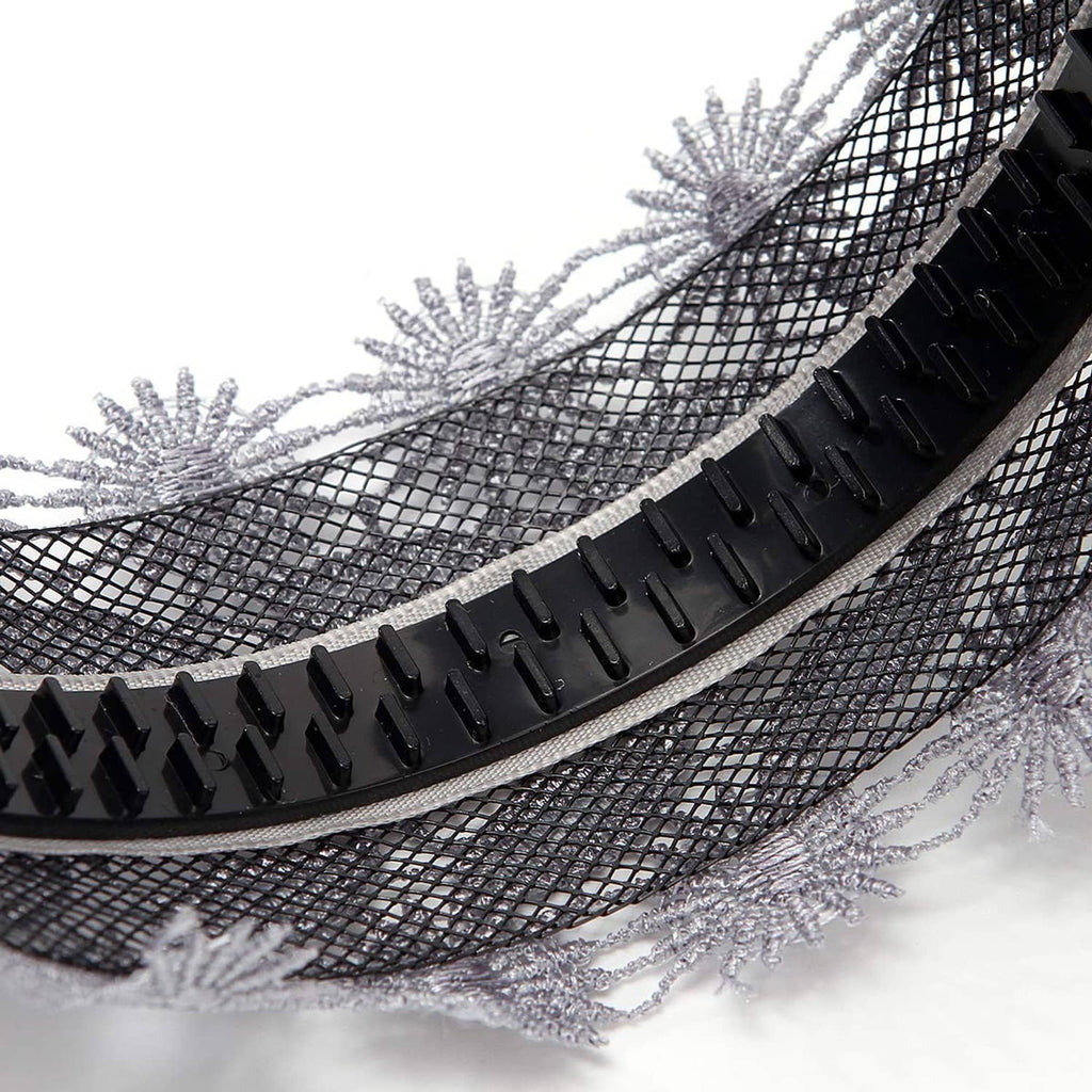 Close-up of silver-gray lace headband with black rubber non-slip teeth strip