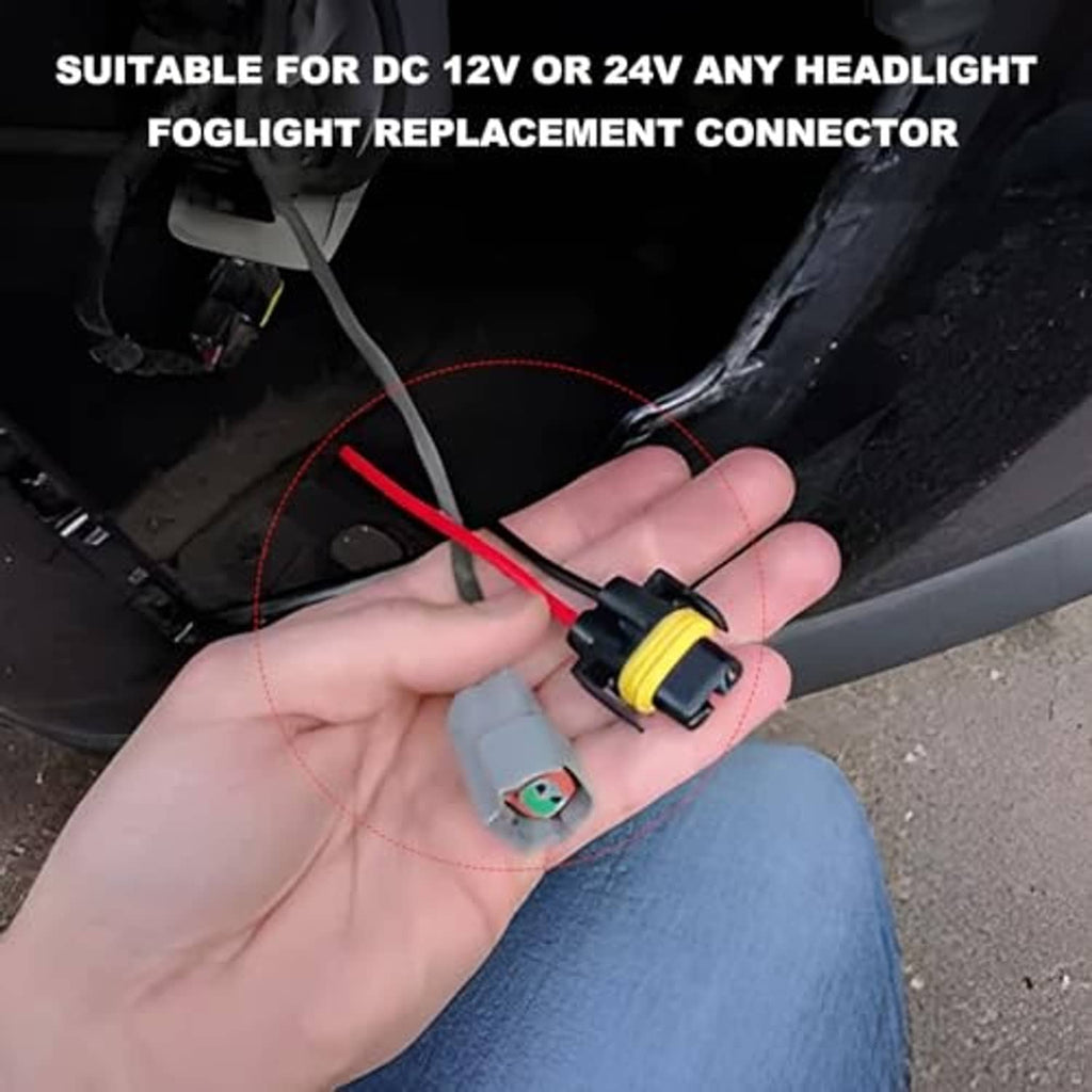 Wiring harness headlight socket connector being installed by hand; yellow-black plug with wires