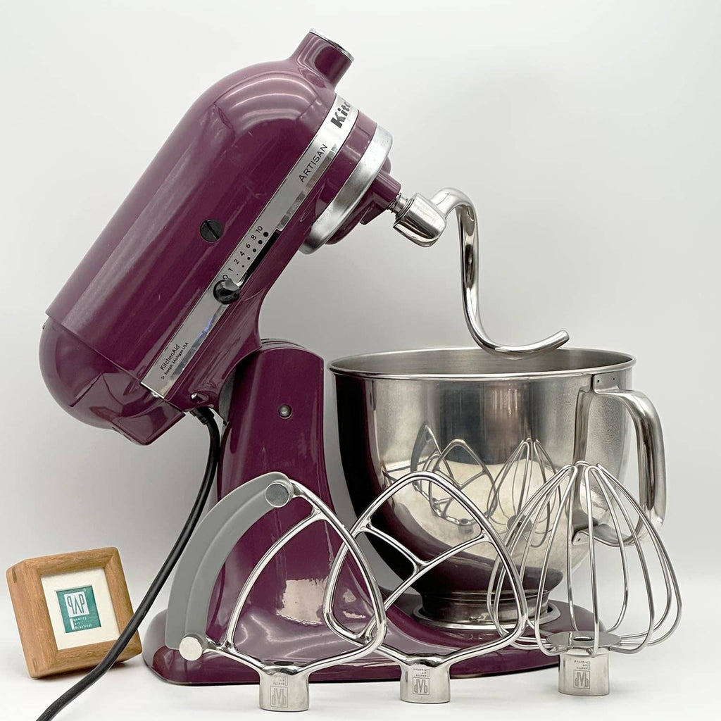 Spiral dough hook on purple stand mixer, polished silver attachment