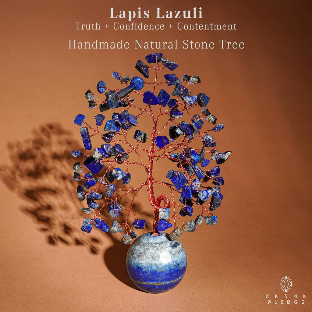 Handcrafted Tree of Life decor with deep blue lapis lazuli stones and round stone base