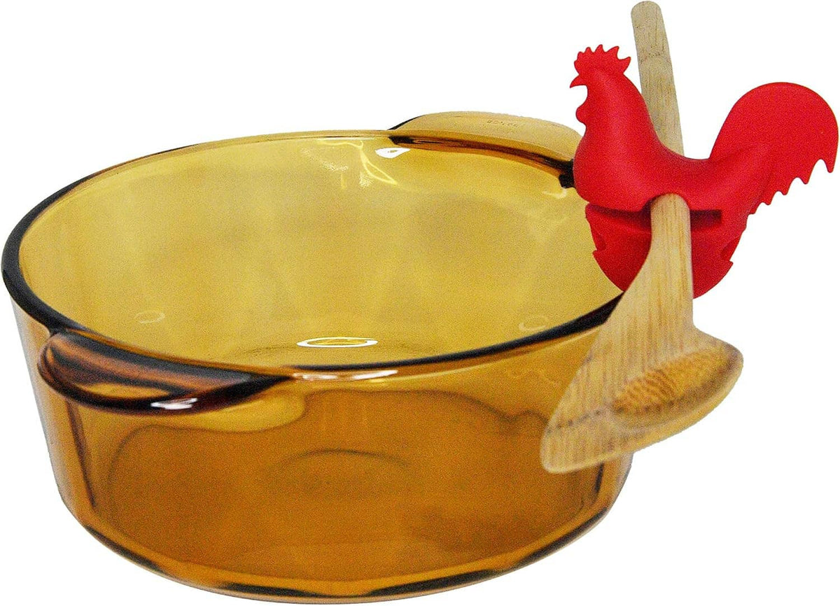 Red rooster clip on amber glass cooking pot lid