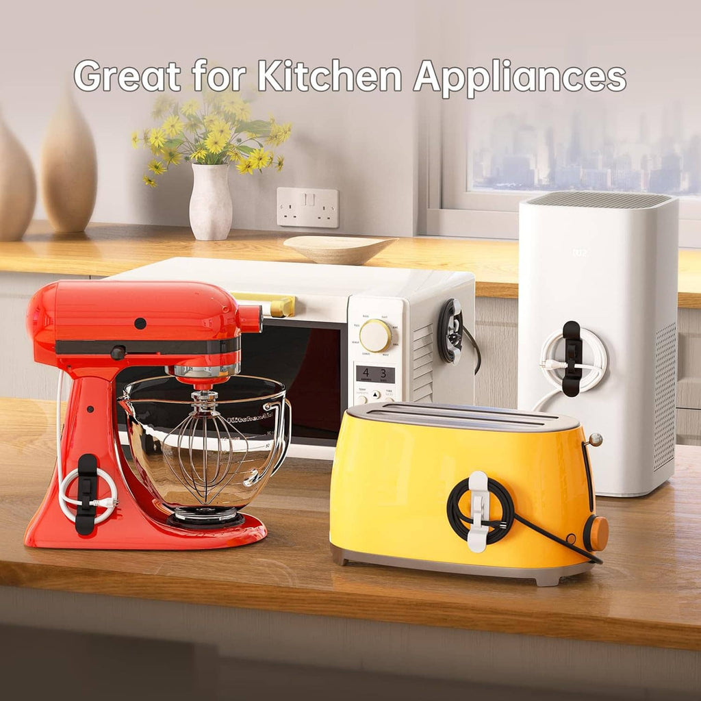 Kitchen appliance cord holders installed on a mixer and a toaster