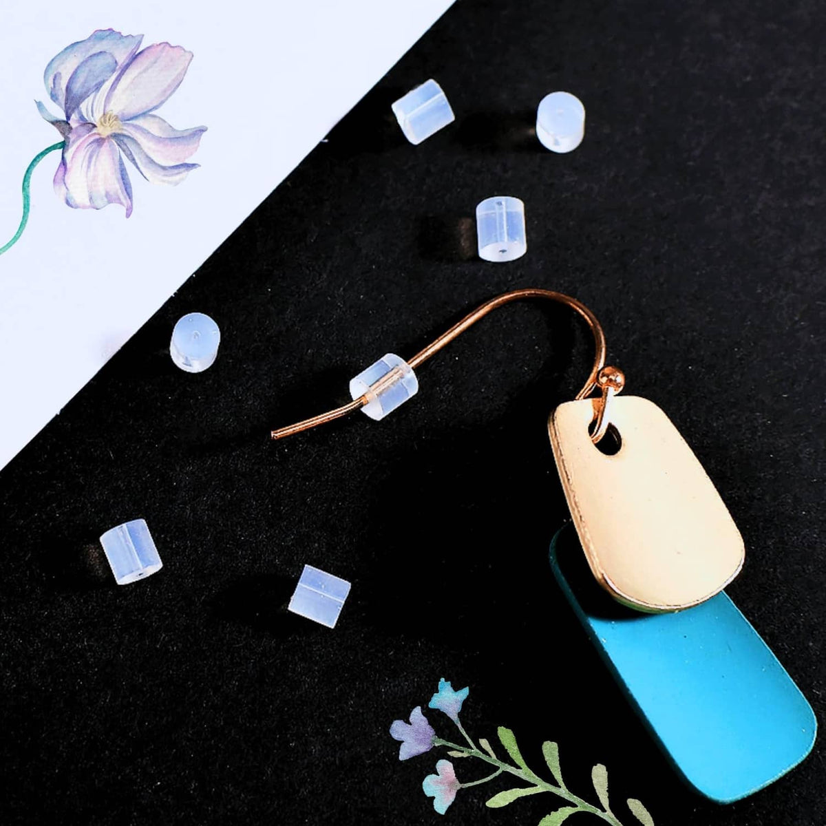 Clear silicone earring backs with stud posts, small clear cylinder stoppers