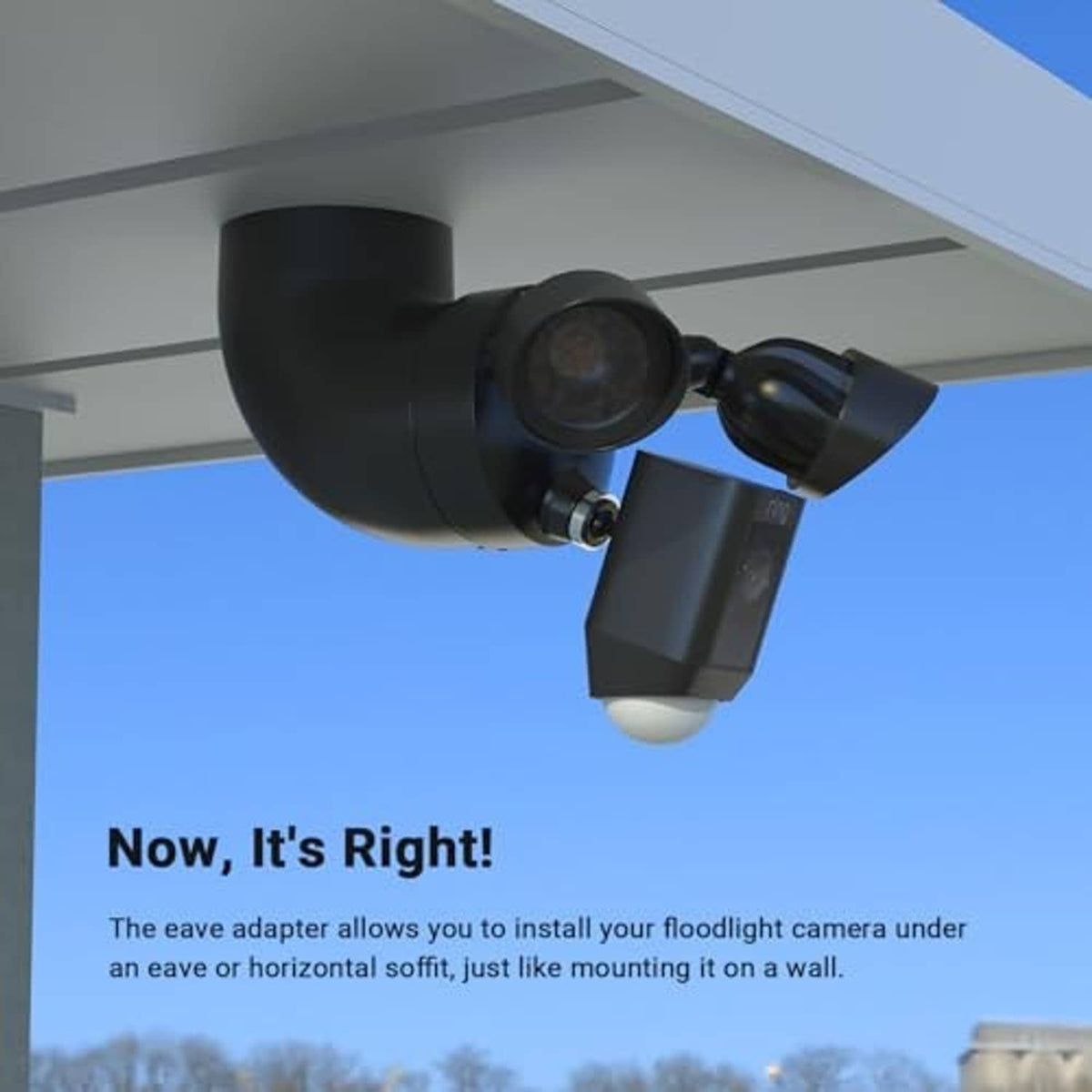 Eave mount adapter installed under eave with floodlight cam and power module
