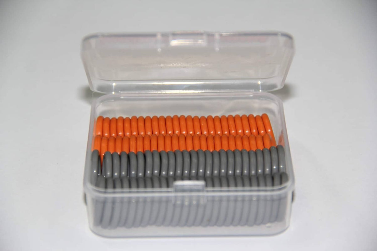 Pressure washer O-ring seal kit with orange and gray O-rings in an open clear container.