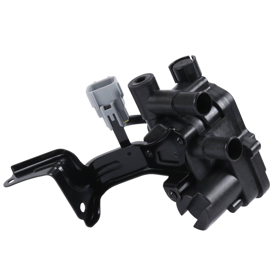 Heater coolant control valve with gray and black connectors and coolant ports