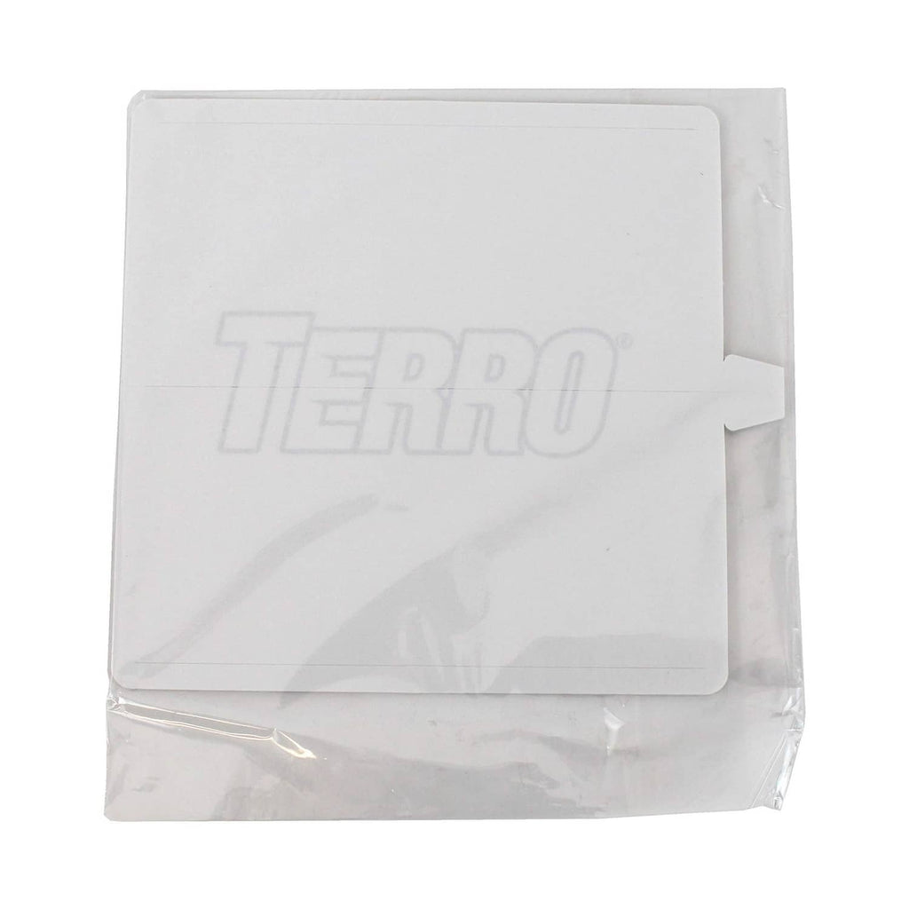 Sealed white TERRO flea trap glue board refill pack in clear plastic