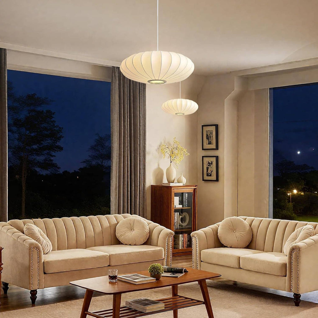 White ribbed bubble lantern pendant light over living room seating