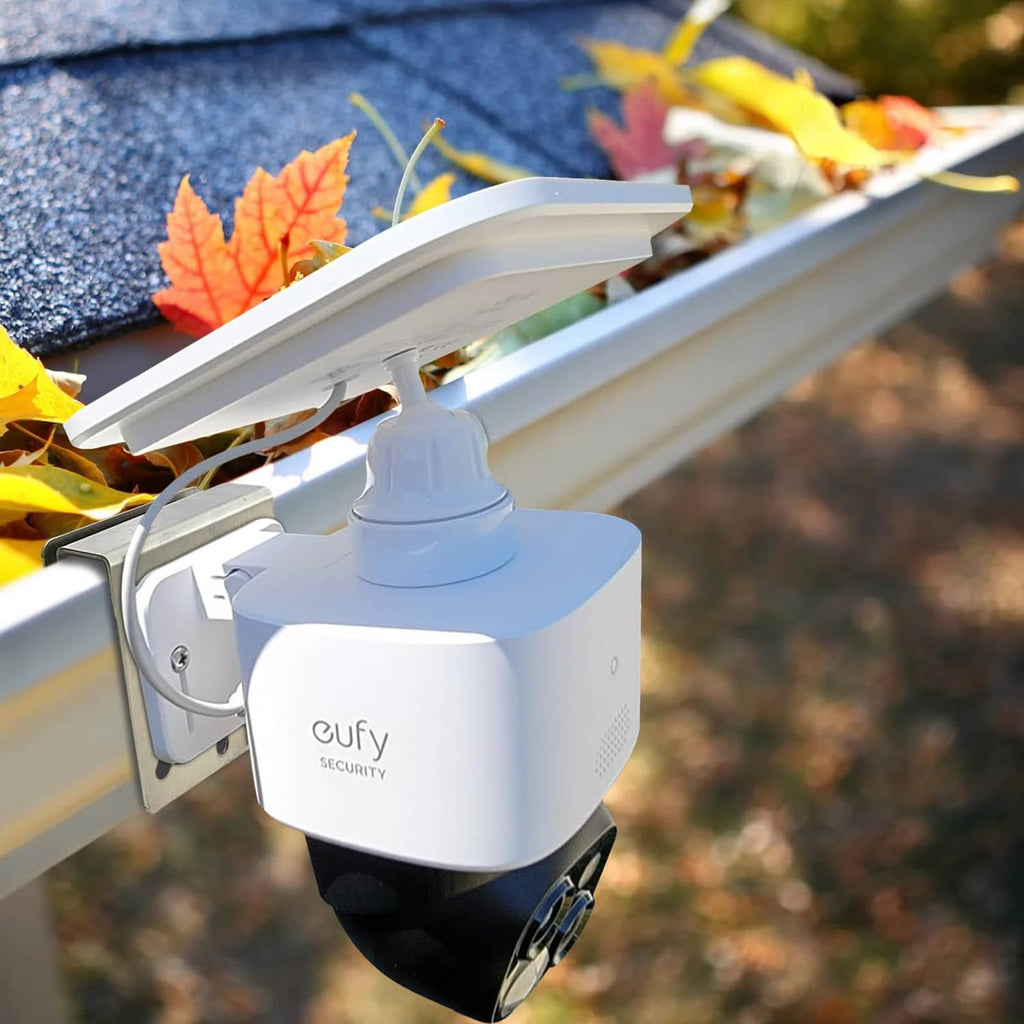 Stainless steel gutter mount bracket holding a white security camera