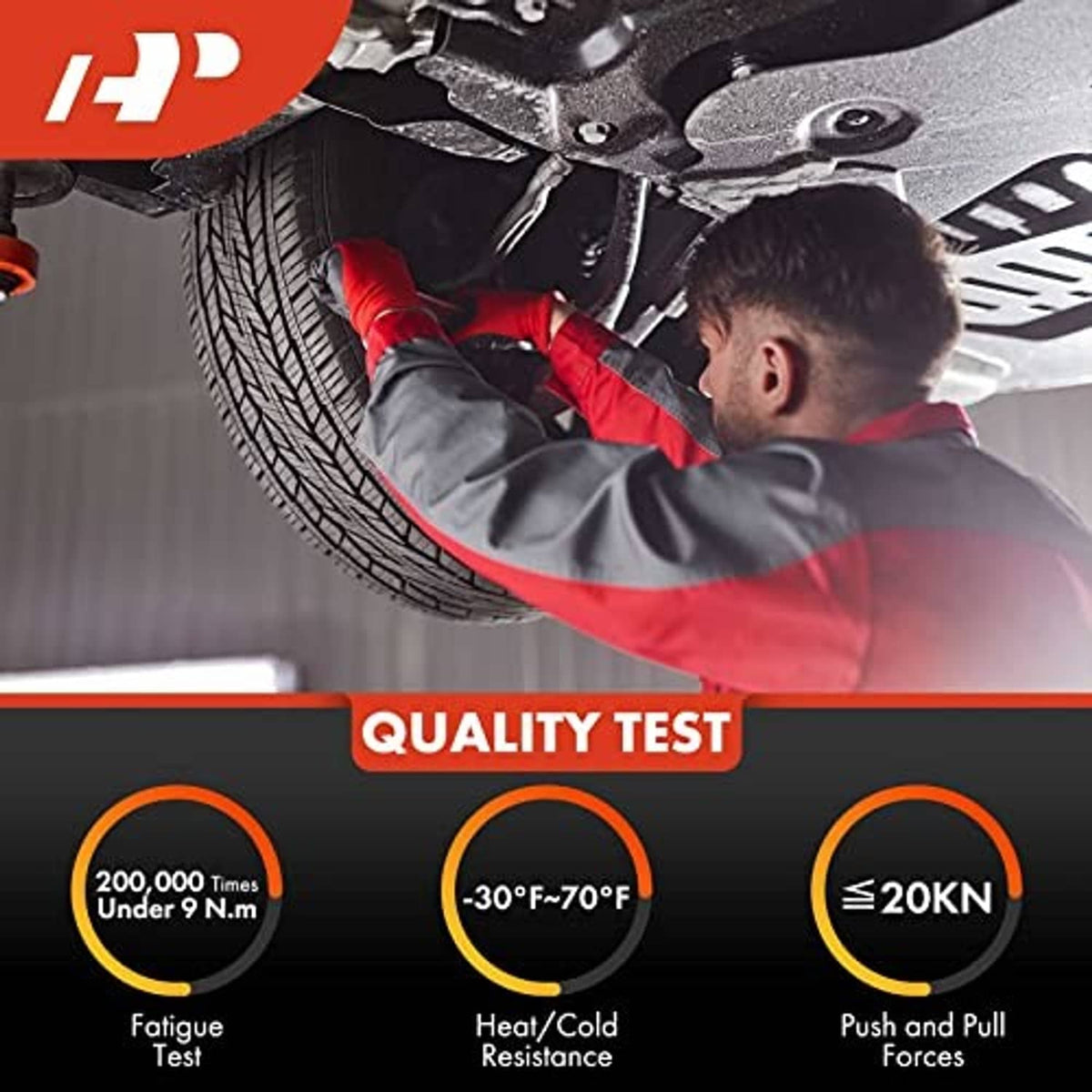Mechanic working under the vehicle near the front ball joint rubber boot