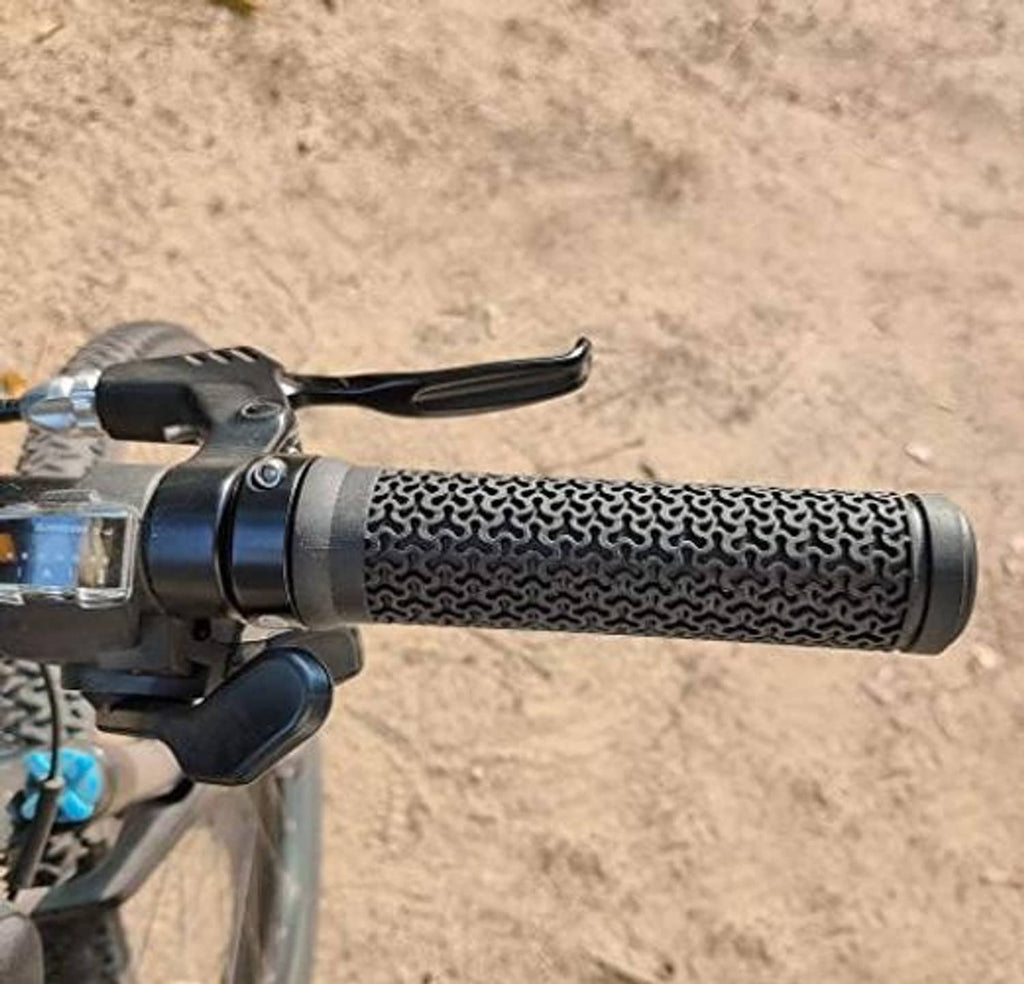 Black textured handlebar grip with lock ring installed on BMX-style handlebar