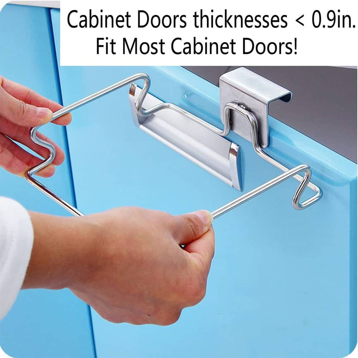 Stainless steel trash bag holder being attached to a thick cabinet door