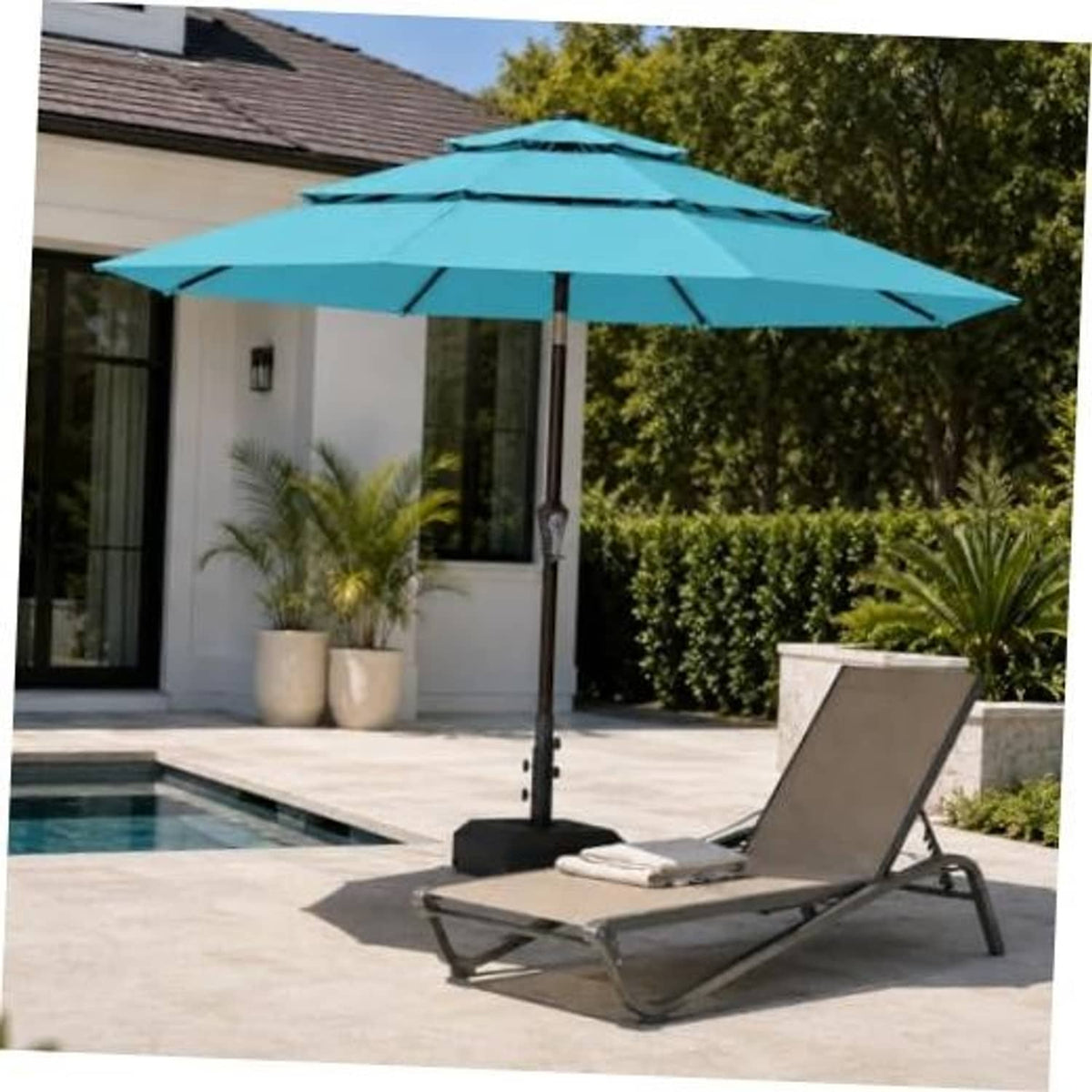 Sky blue 3-tier patio umbrella with vented canopy and sturdy center pole over patio