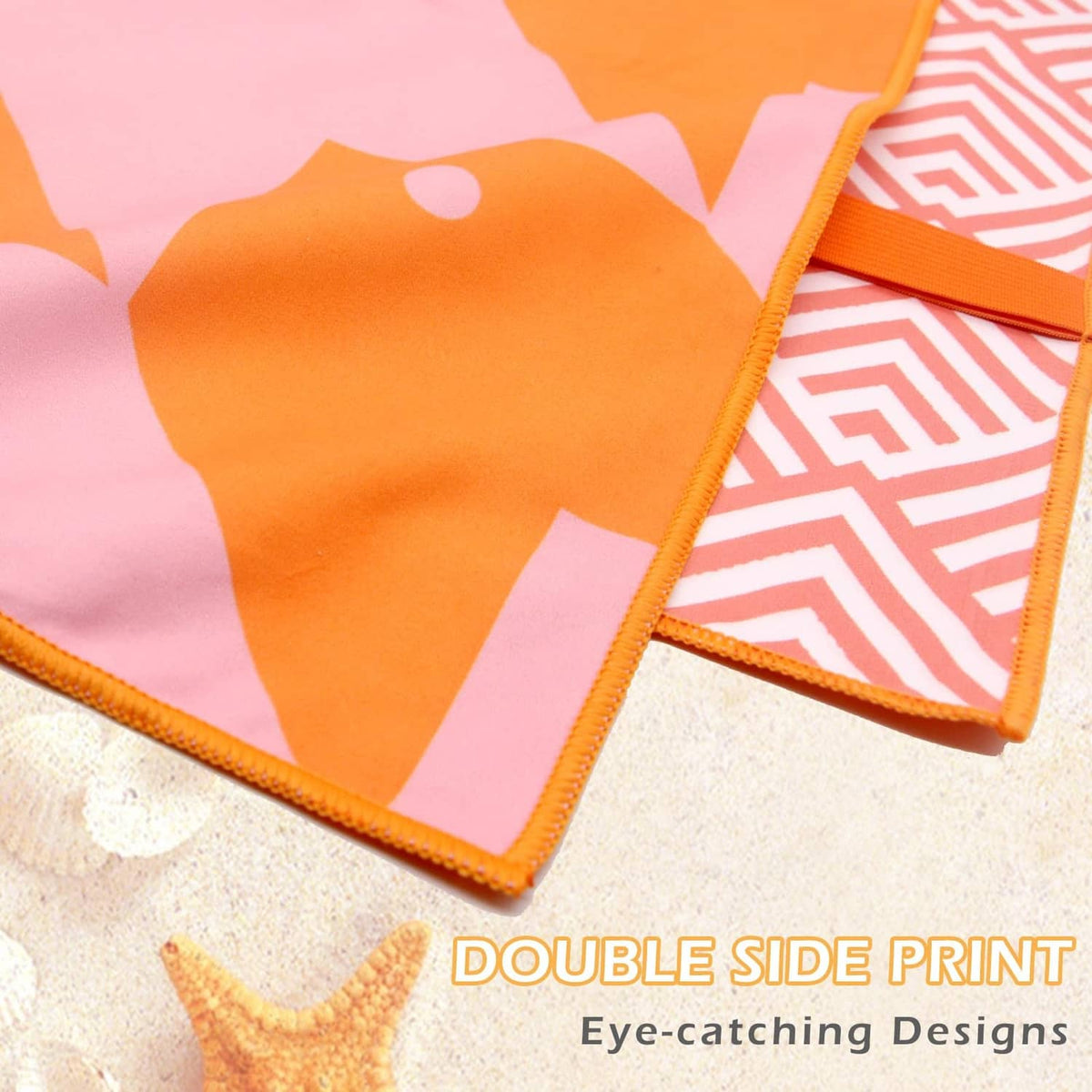 Orange beach towel with white palm-and-geometric double-sided border and trim.