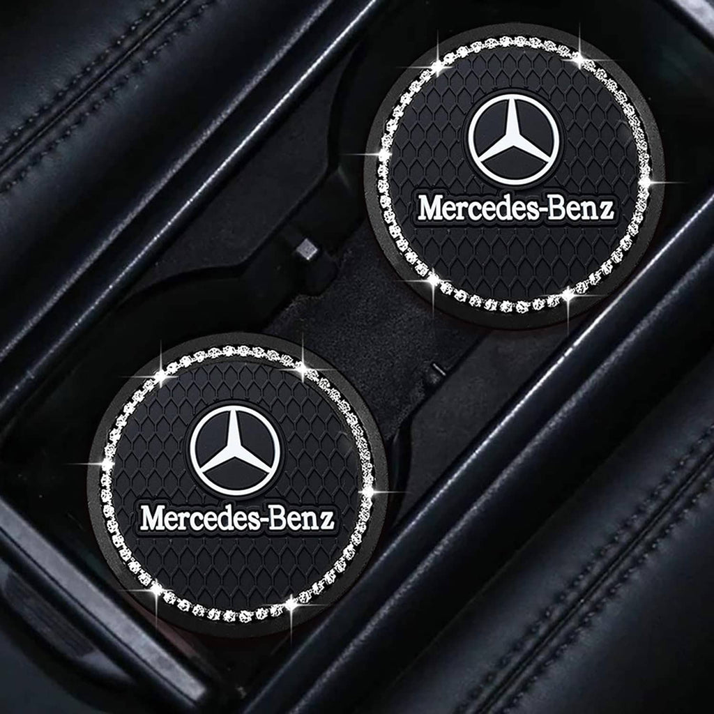 Black oval car cup holder coaster with Mercedes-Benz logo and rhinestone outer edge
