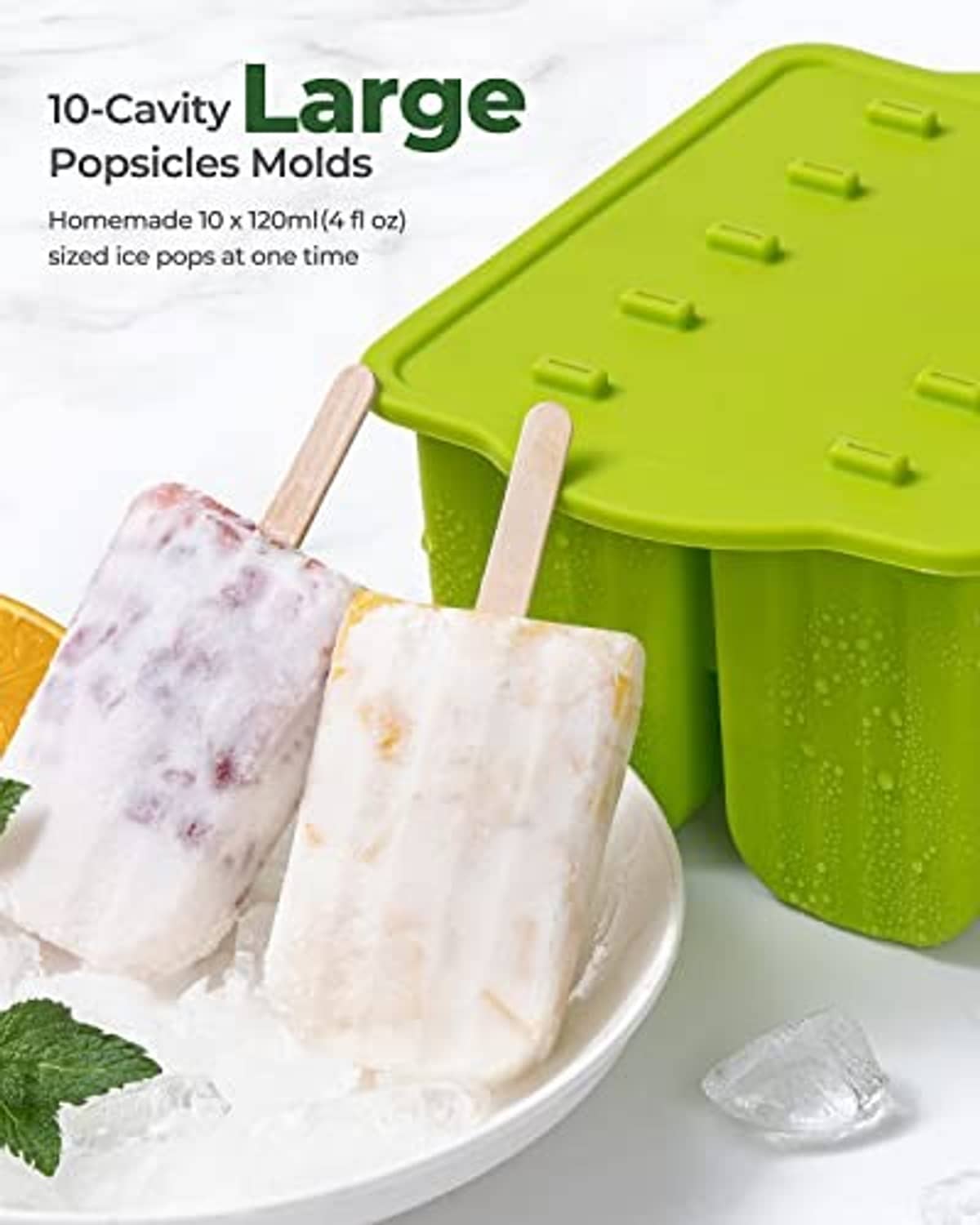 Large green silicone popsicle molds with wooden sticks and partially frozen popsicles