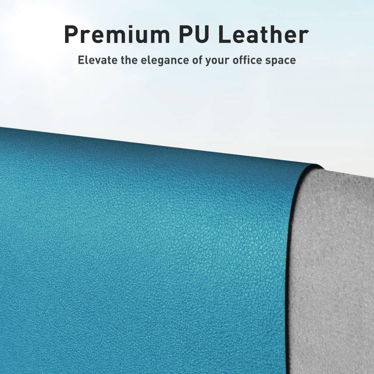 Turquoise leather desk pad with textured finish and gray backing edge