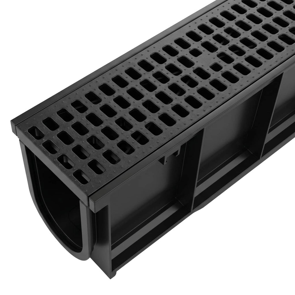 Black slotted grate top on HDPE linear drainage channel with curved end outlet