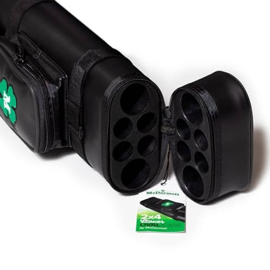 Black cue case end opening with molded tube holds and zipper storage compartments.
