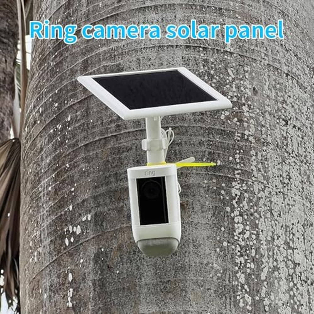 Outdoor solar panel charger mounted above Ring camera on exterior wall