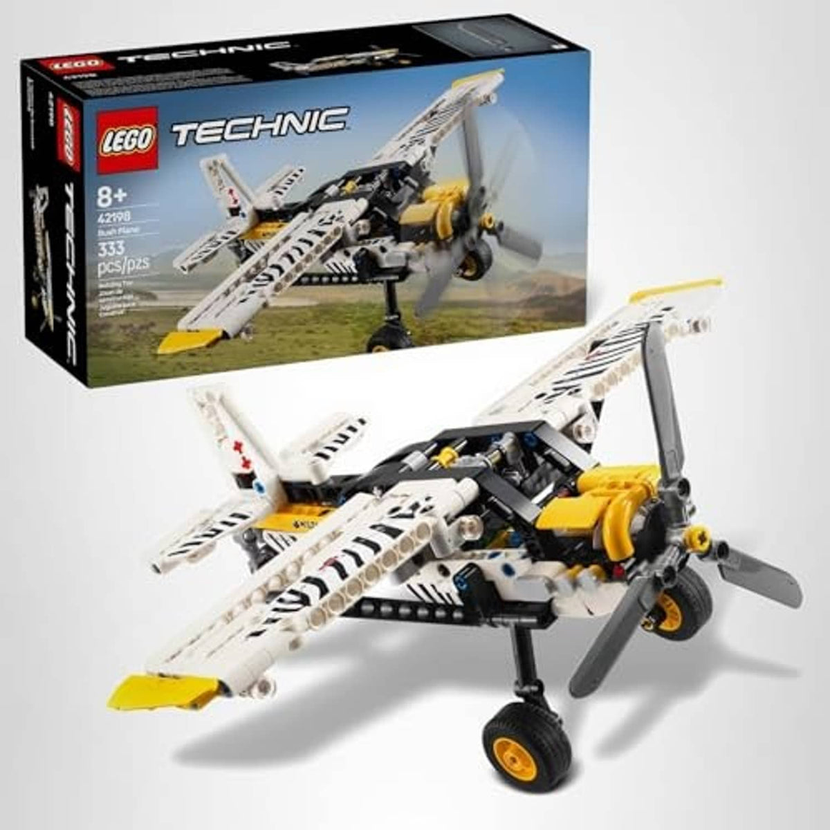 LEGO Technic bush plane toy product shot with multicolor airplane model and box