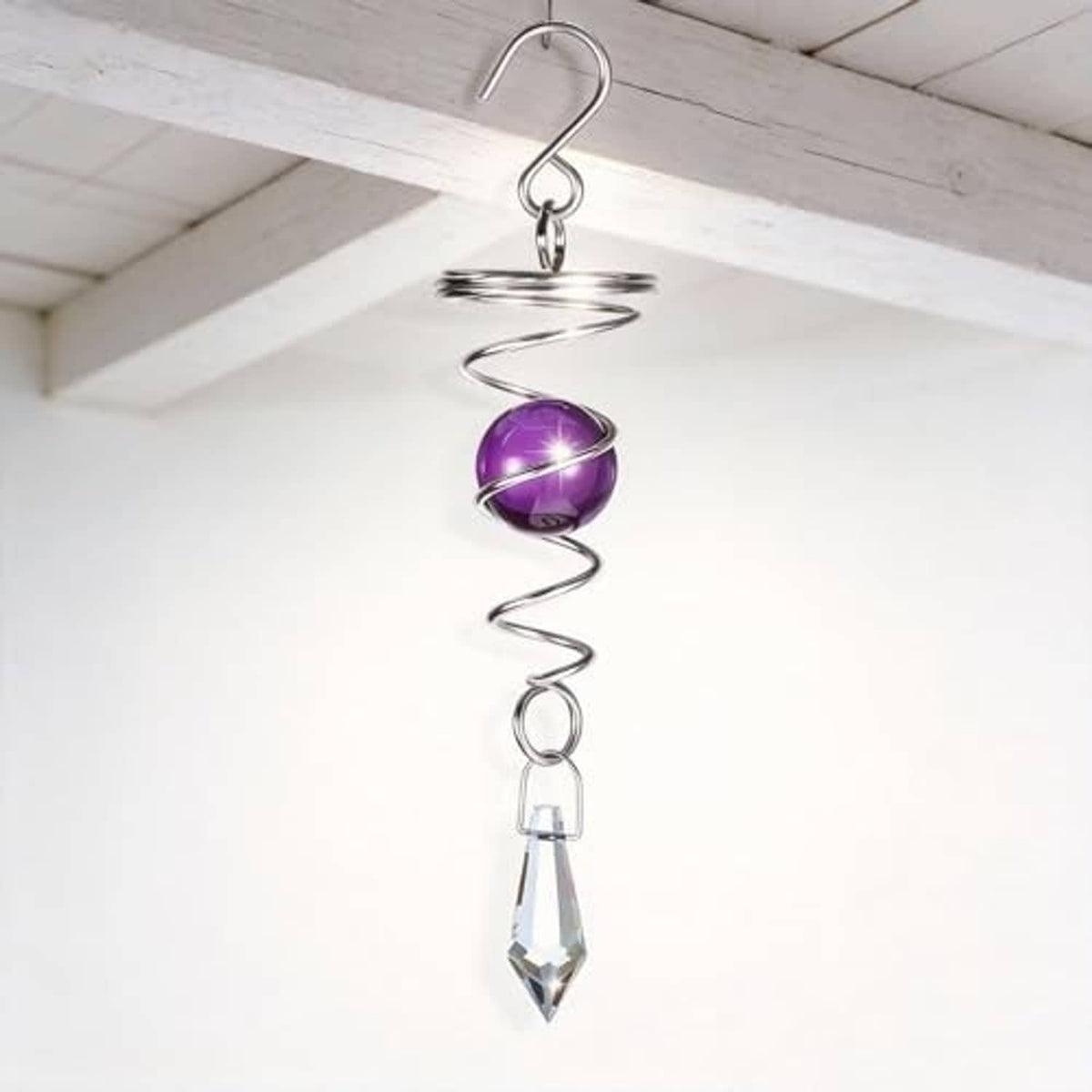 Single hanging stainless steel wind spinner with purple sphere and clear crystal drop