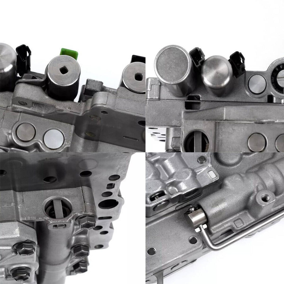 Transmission valve body close-up showing solenoid tops and machined valve passages, gray