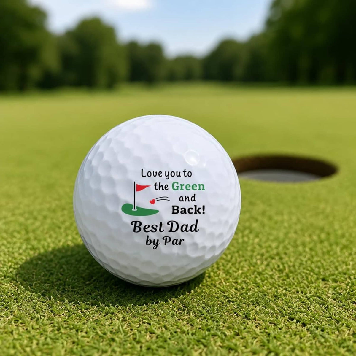 White golf ball on the golf green with "Best Dad by Par" message