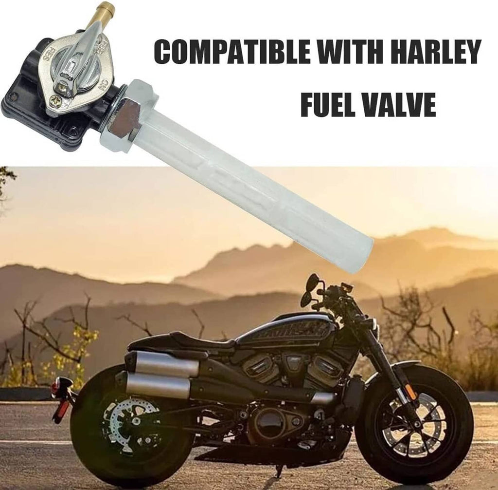Fuel valve petcock mounted on motorcycle tank, with chrome switch top and clear fuel tube.