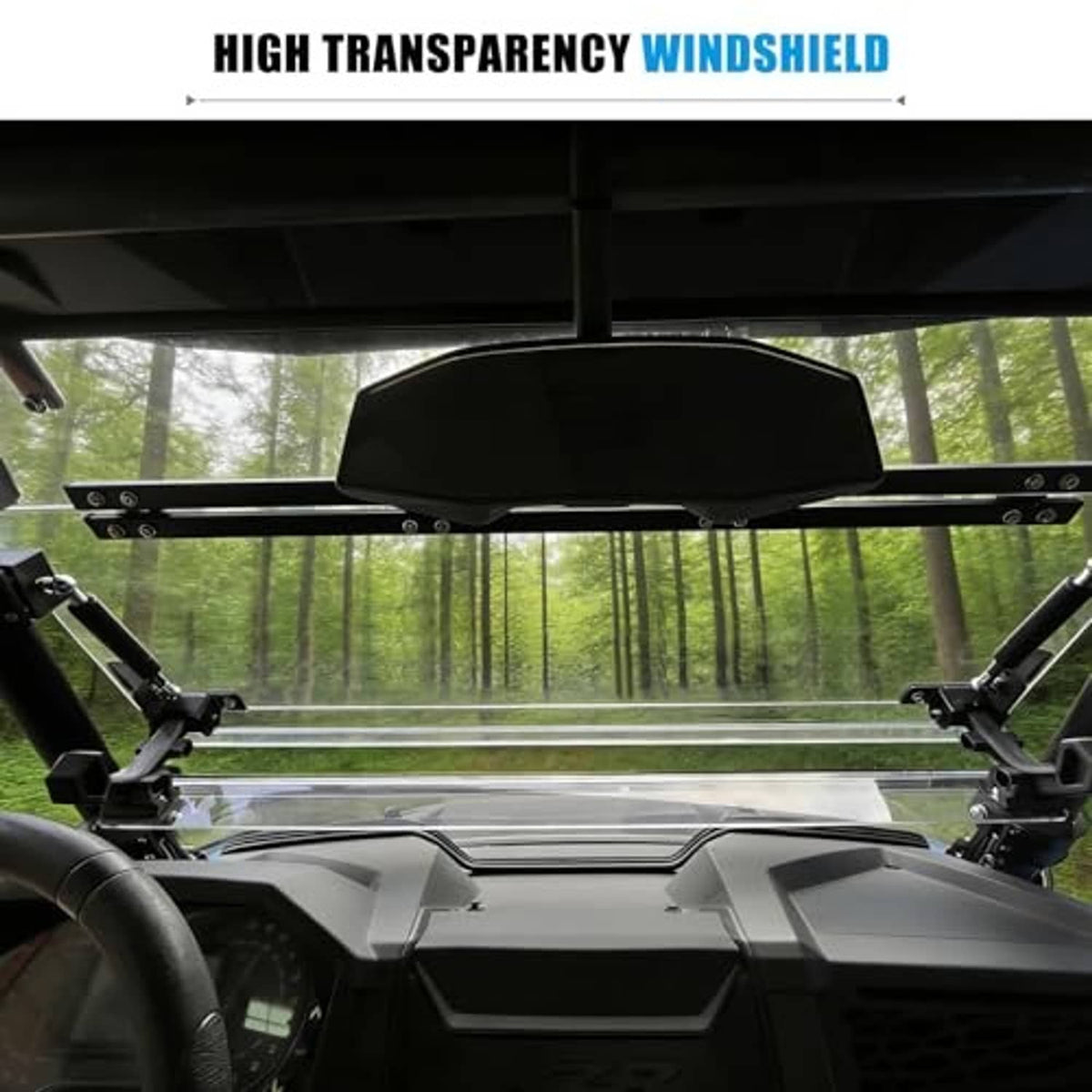 Transparent windshield panel viewed from inside the UTV with side mounting brackets