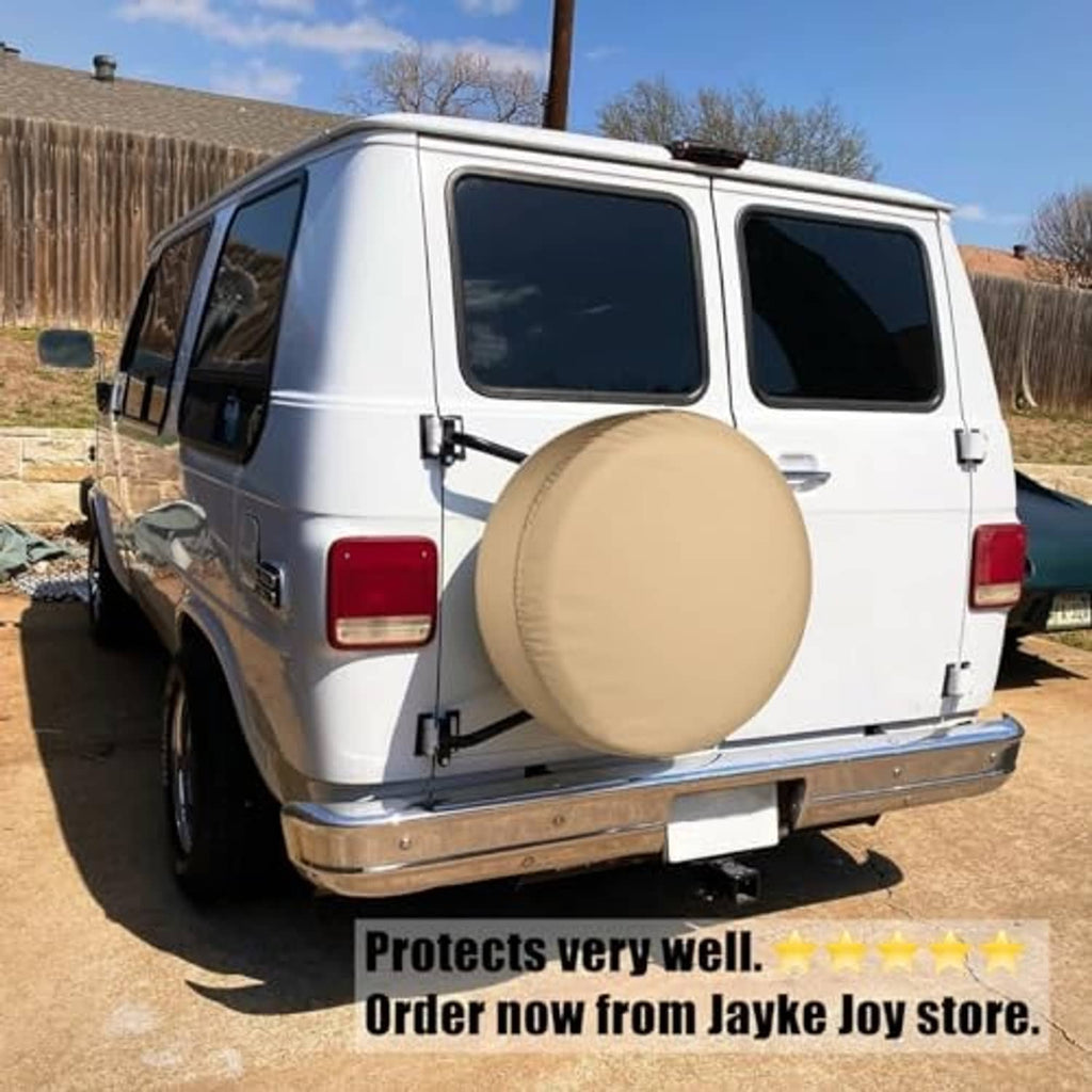 Beige spare tire cover mounted on a rear vehicle door, round profile.