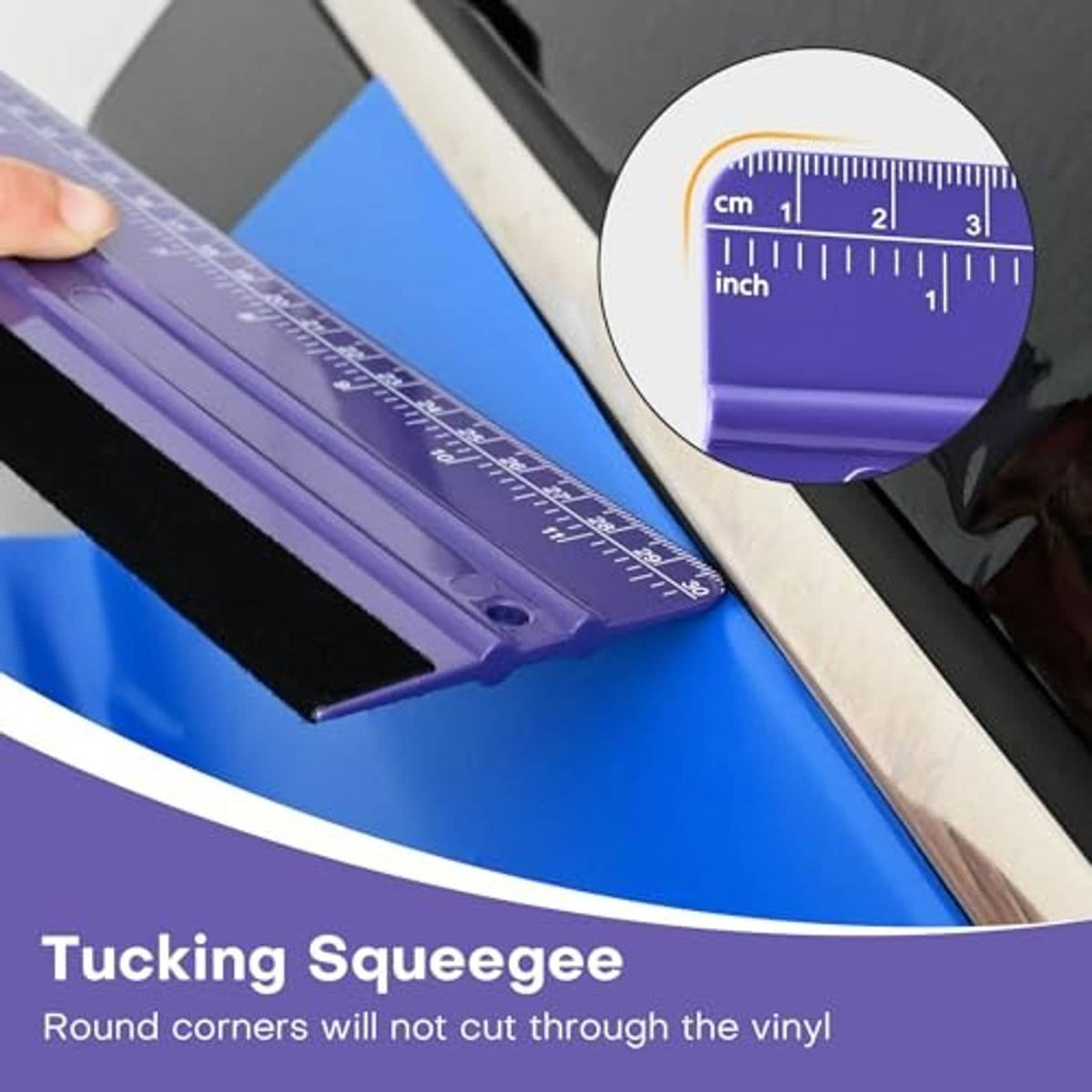 Purple felt squeegee ruler sliding across a surface, showing measurement markings